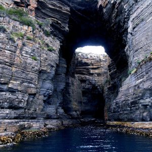 The Tasman Arch of Eaglehawk Neck, a feature in the Tasmania National Parks tour