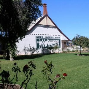 Historic Bourke Motel in a garden of roses on our Big Rivers Outback NSW Tour