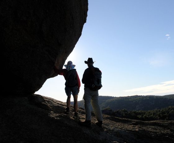 Leaning on a balancing boulder atop The Pyramid of Girraween National Park seems like a good thing to do after the climb, but there is still the descent