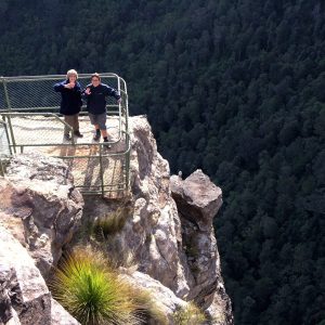 Greater Blue Mountains, guests standing on Pulpit Rock precipice, a Great Divide Tour experience