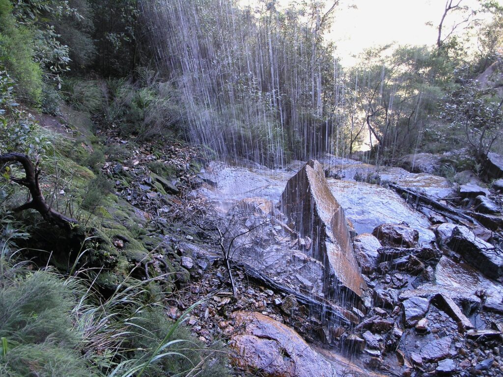 Trail under waterfall, National Pass, Blue Mountains